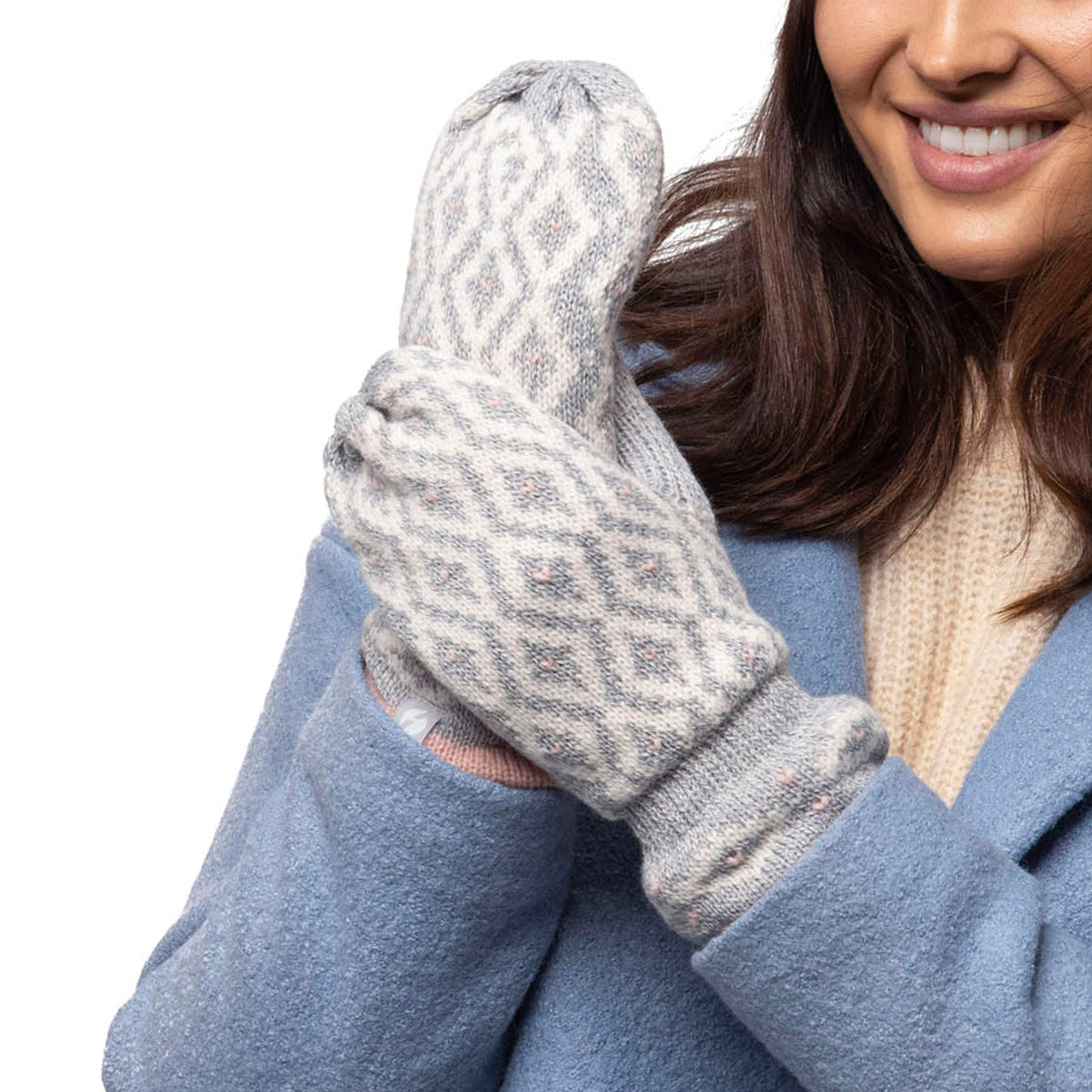 Premium Photo  Woman mittens dressed fashionable gray stands with