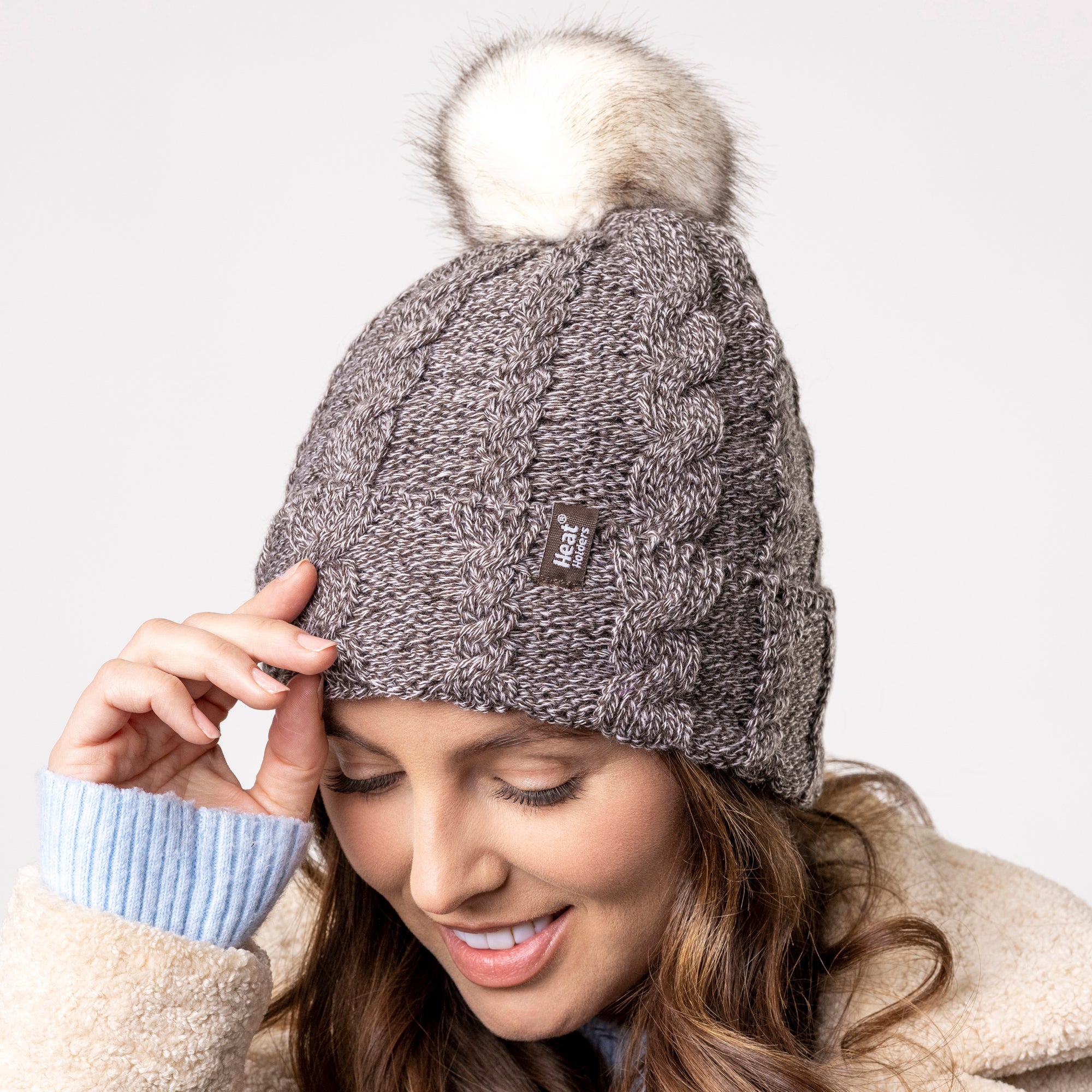 Ski hat with fur pom pom on sale